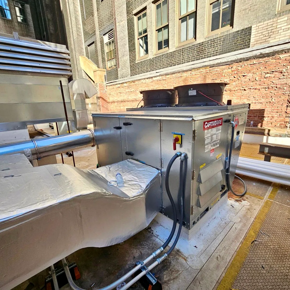Rooftop air-handling equipment connected to insulated ductwork